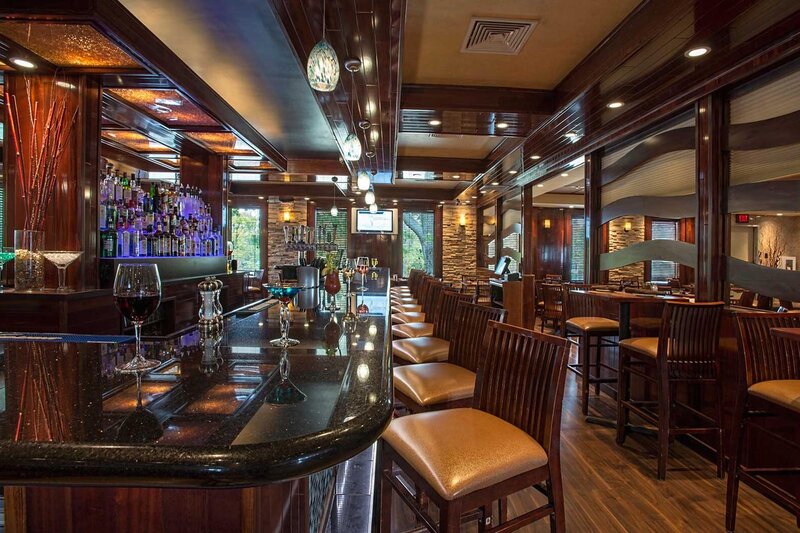 Bar seating area with cocktails on the bar top