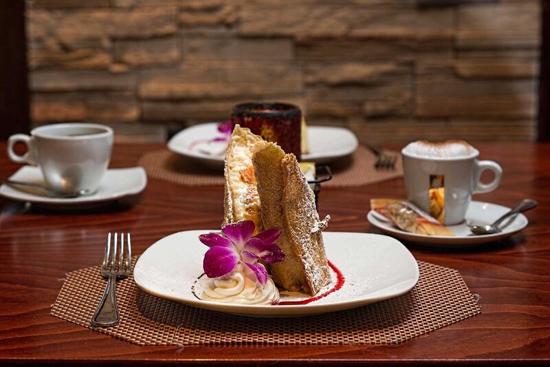 Cream stuffed pastry dessert with coffee